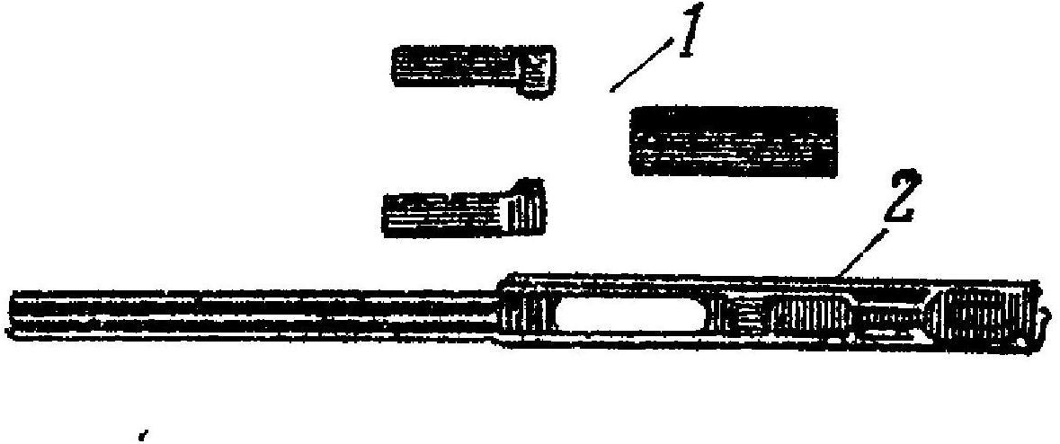 Рис. 20. Части и механизмы ручного пулемета Дегтярева (РПД), собираемые на станке:
